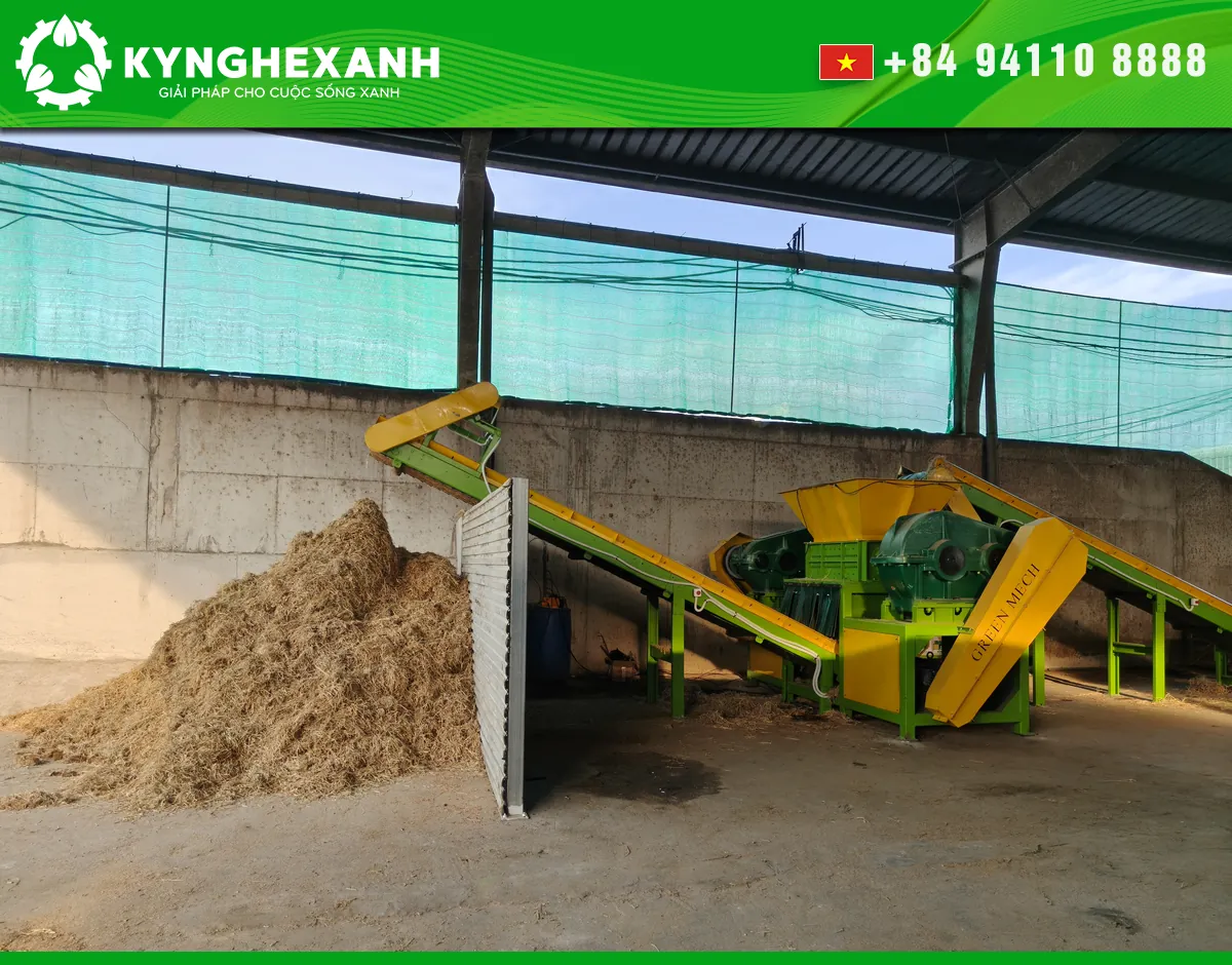 A GREEN MECH straw-processing line with shredded straw at the discharge area