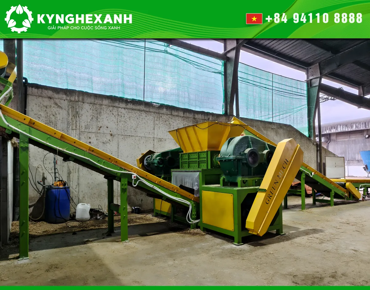 A two-shaft shredder integrated with feed and discharge conveyors